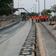 A photo of copper coils being installed underneath a road.